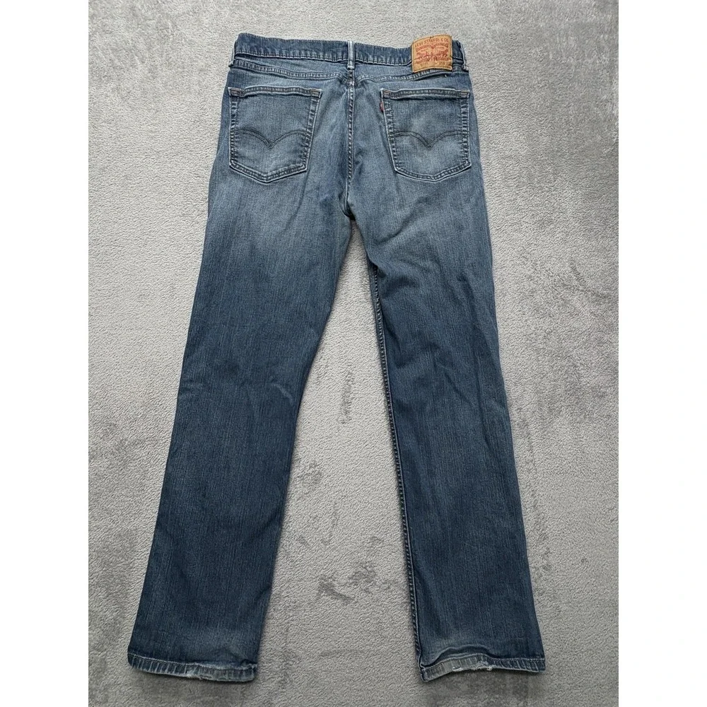 Levis 560 Jeans Mens Measured 35x31 Blue Relaxed Fit‎ Distressed Straight Leg